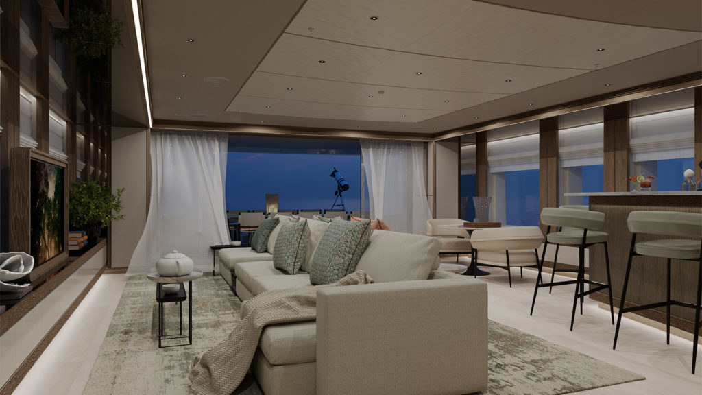 Luxurious living room with beige sectional sofa, patterned cushions, and a telescope by floor-to-ceiling windows overlooking a night view. The room features modern furnishings and decor, subtle lighting, and an open design with a bar area and dining table in the background.