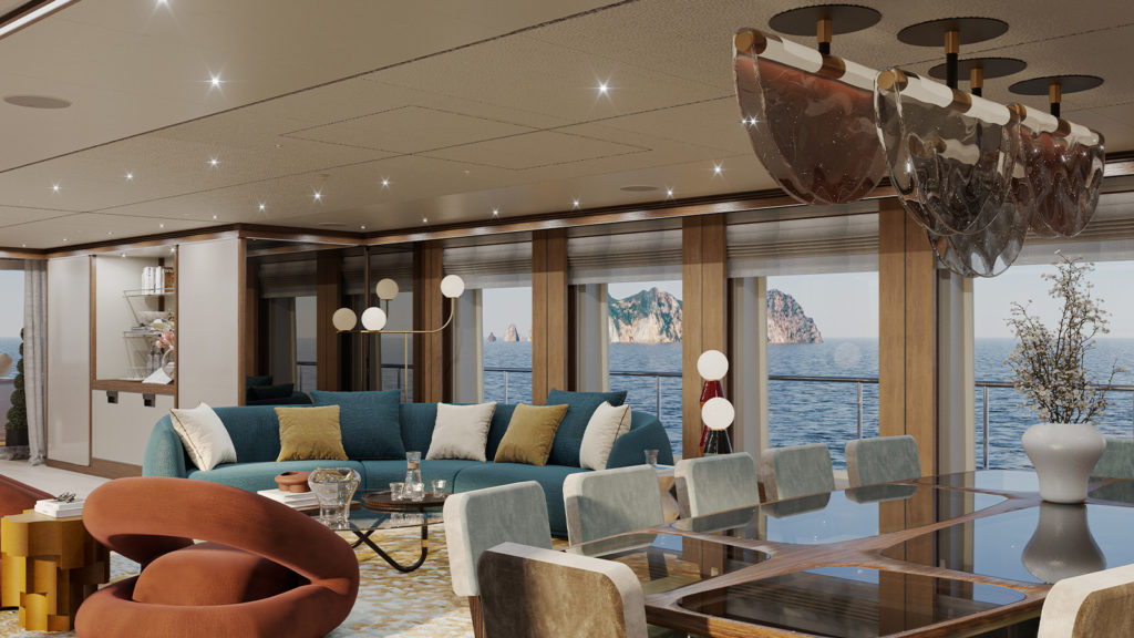 Luxurious yacht interior featuring a modern living area with a teal sofa, glass-top dining table, and abstract lighting fixture. Large windows offer a scenic ocean view with distant rocky cliffs.